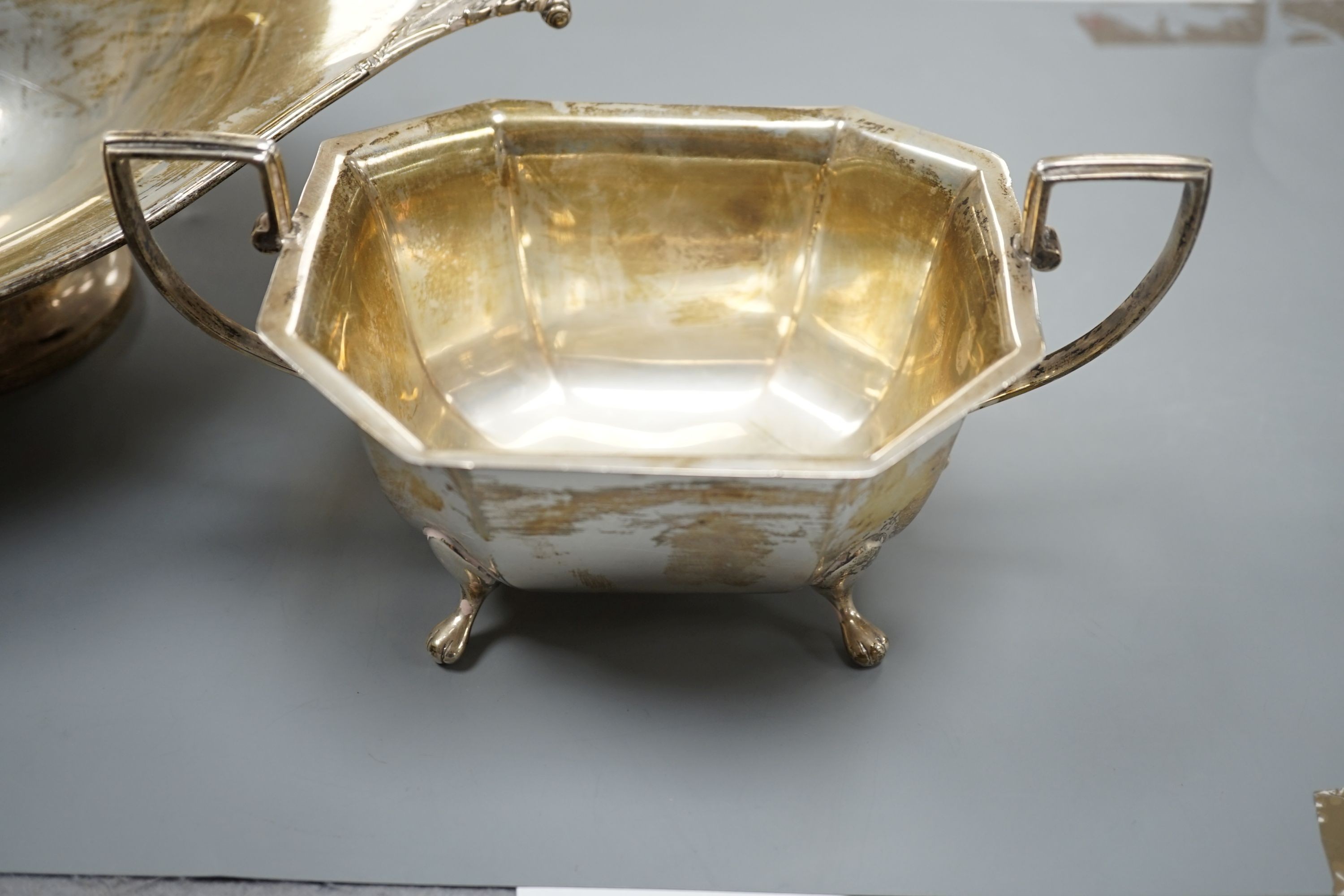 An Edwardian silver two handled fruit bowl, R & S Sorley, London, 1908, 31.9cm and a later two handled sugar bowl, 20.5oz.